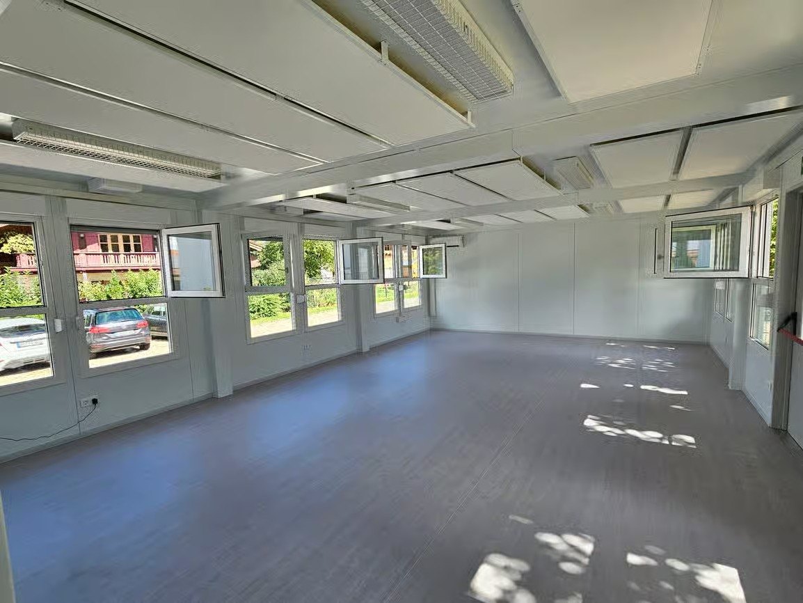 classroom shell with full height windows ready for fit out