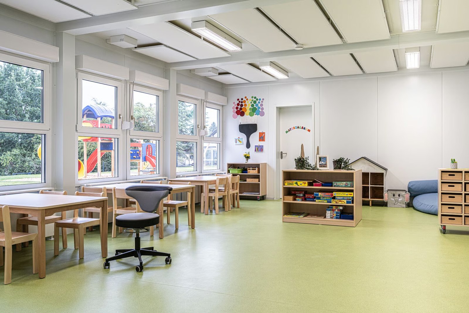 fitted modular nursery room with childrens tables and play corner