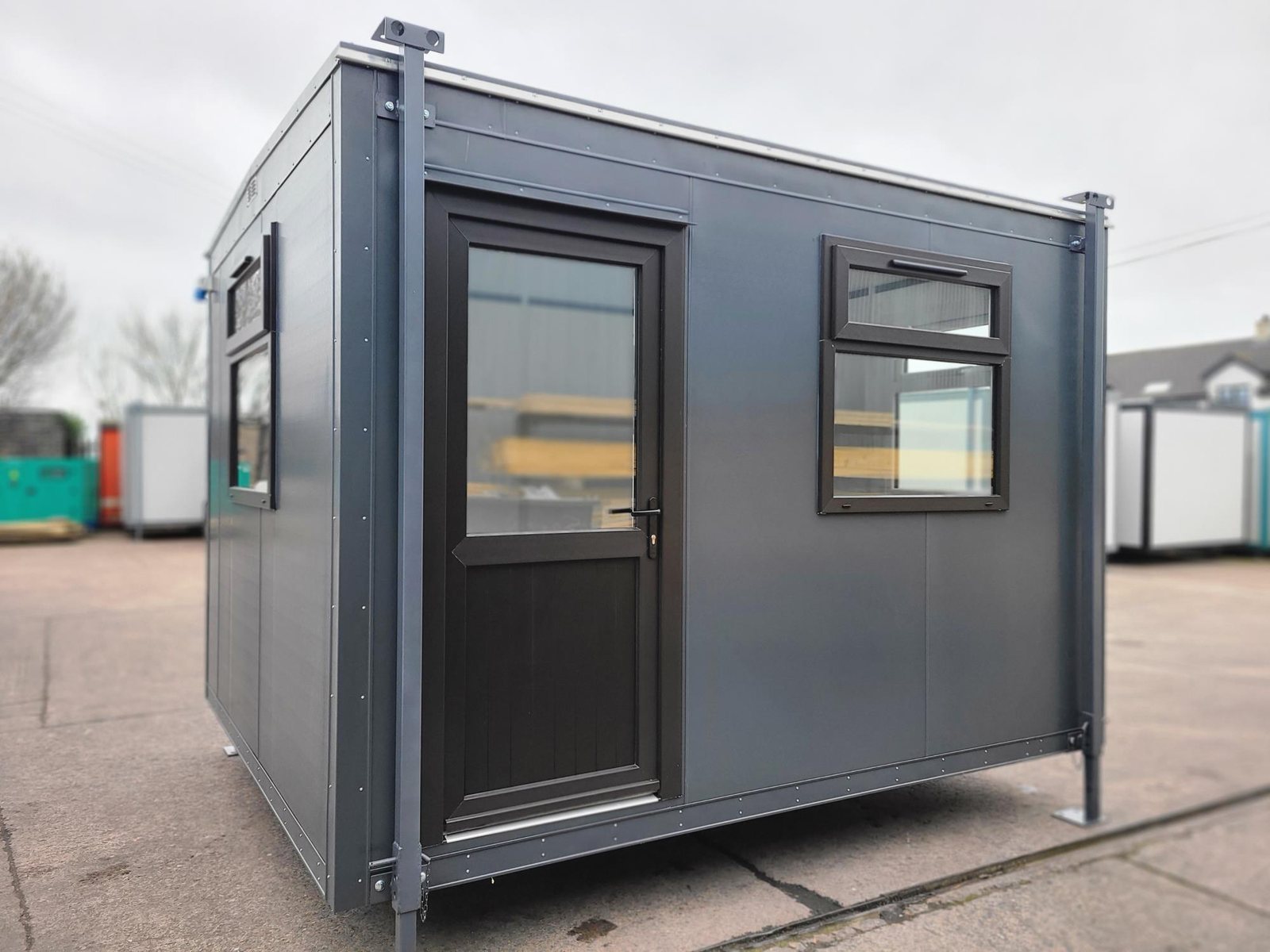 anthracite grey jackleg cabin with black door