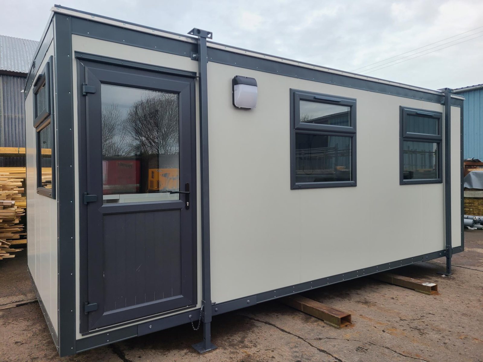 20ft by 10ft jackleg site office, standard timber frame range with half glazed door