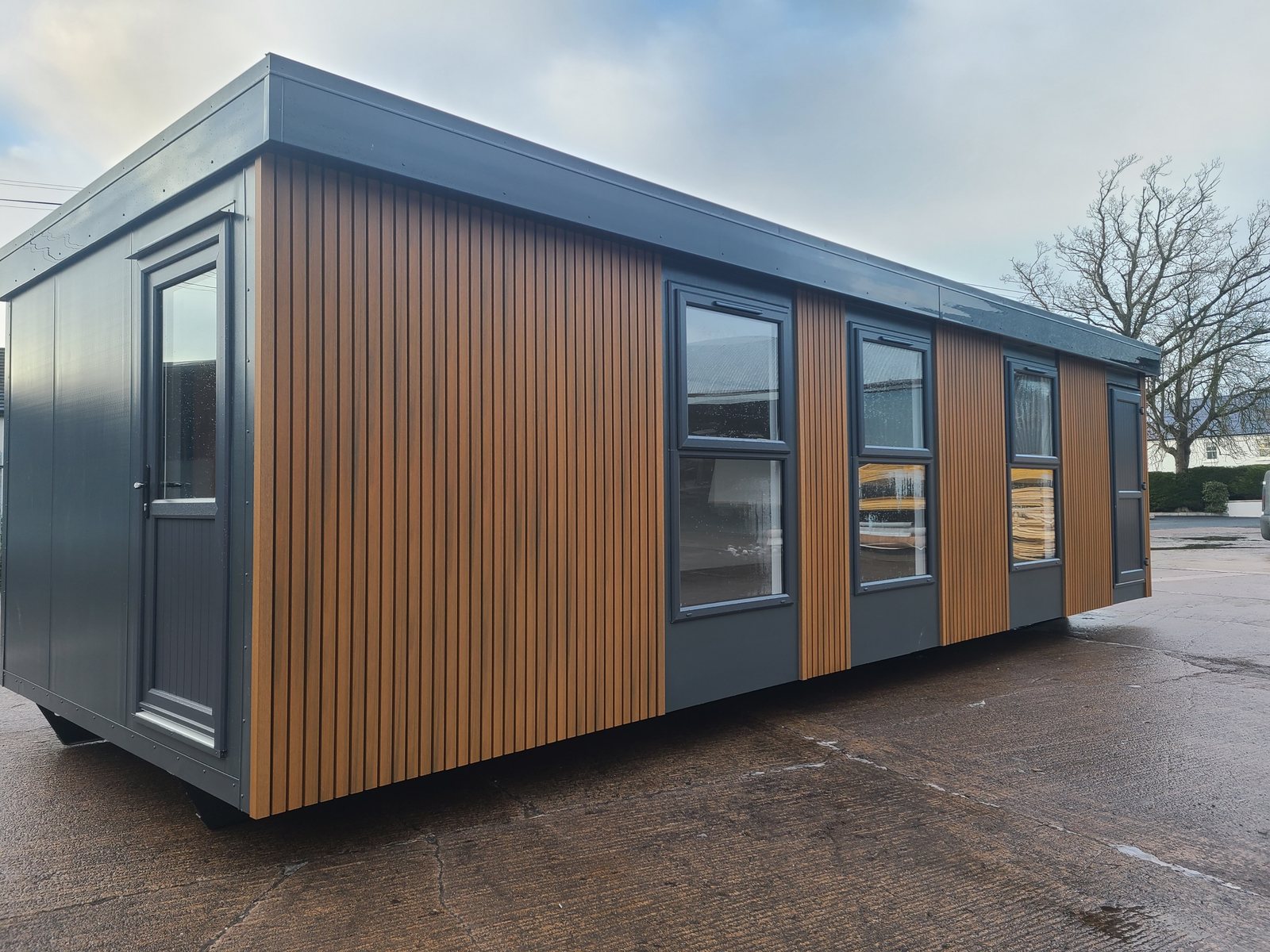 cedar clad timber frame nursery building with anthracite trim
