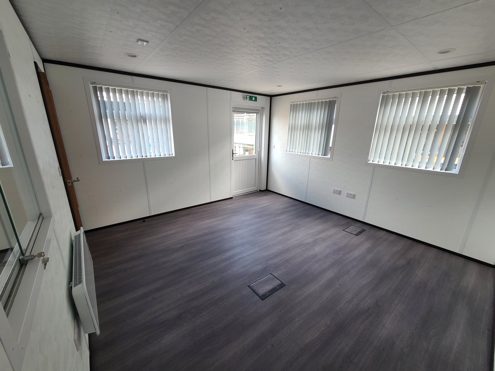 fitted classroom interior with blinds and dark floor