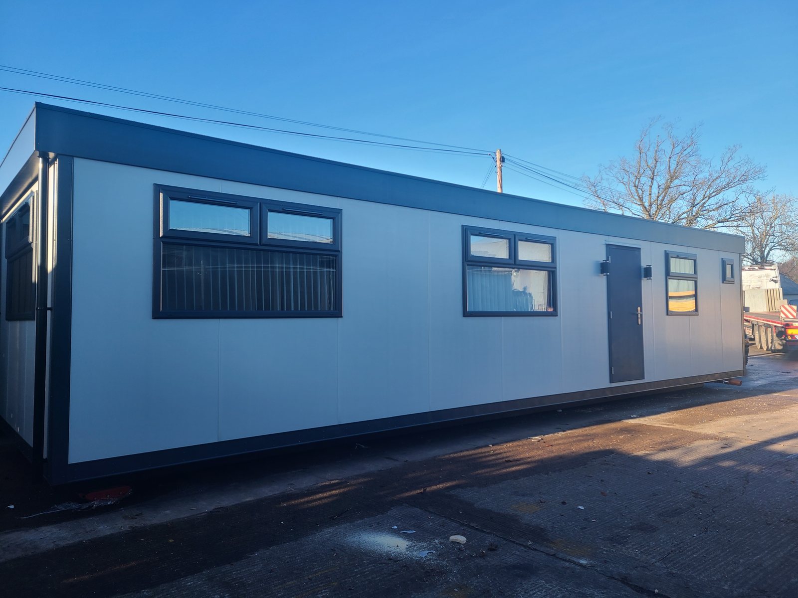 long modular staff welfare building with anthracite trim